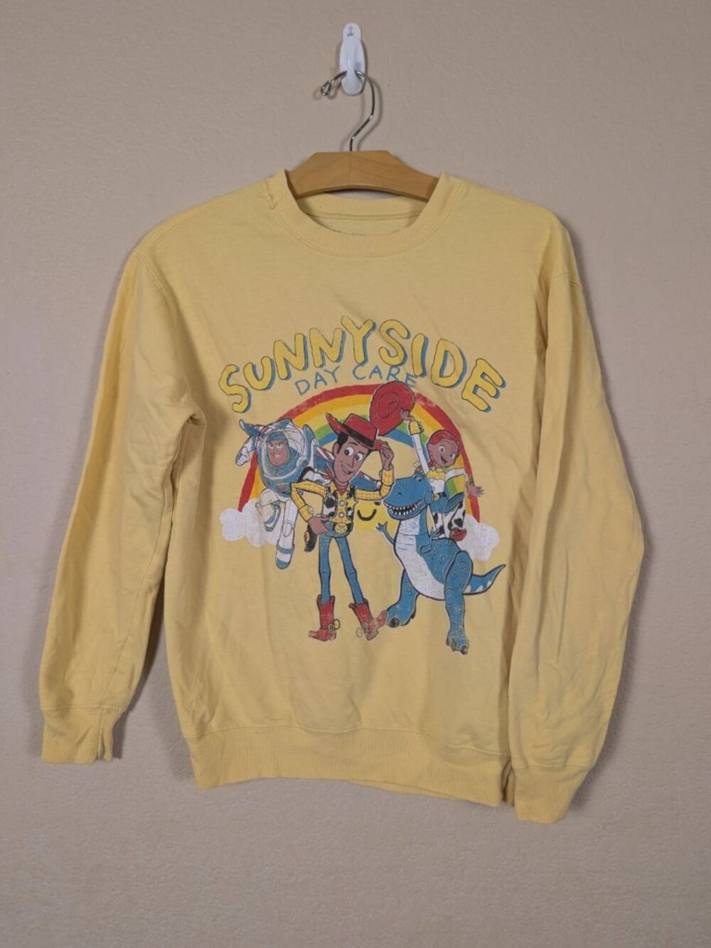 Toy Story Sweatshirt Sunnyside Daycare size xs womans Yellow